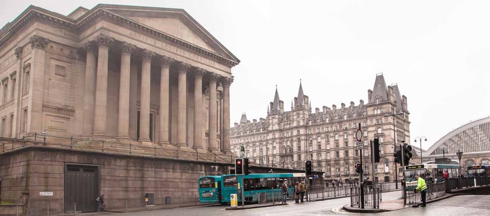 Side of St George's Hall with Lime Street Station beyond.
